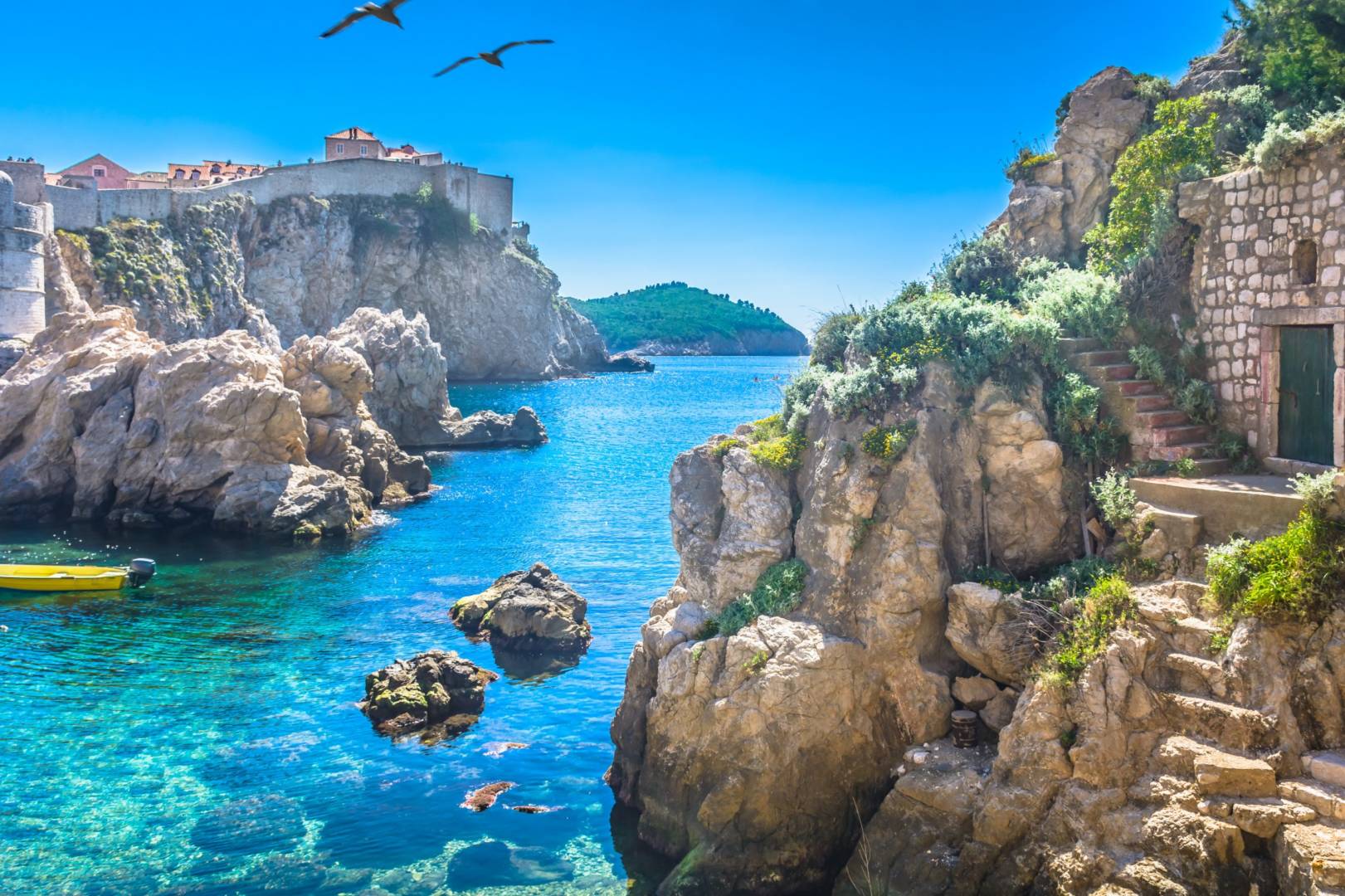 Adriatic sea bay Dubrovnik. / Marble hidden bay in old city cent